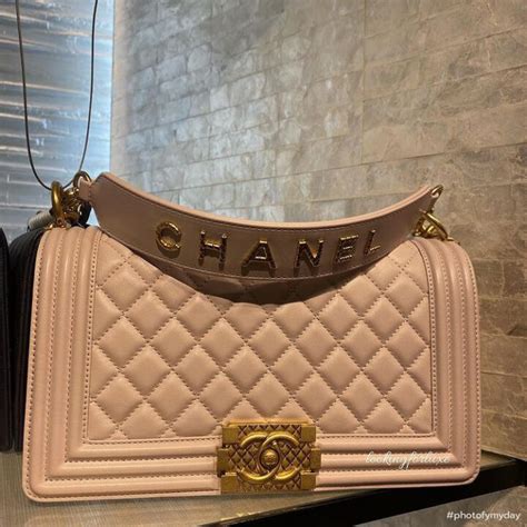 chanel boy bag with signature strap and quilted logo|chanel black boyfriend bag.